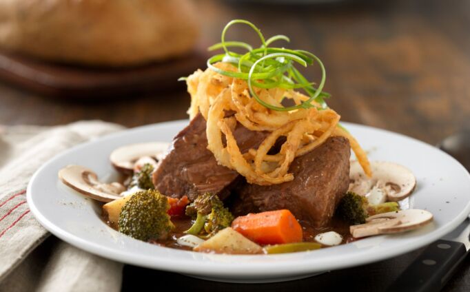Slow-Cooked Beef Pot Roast Soup with Roasted Vegetables and Lemon Crema